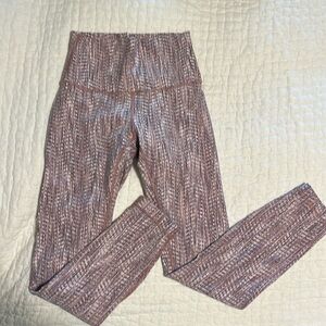 Lululemon size 4 leggings pink.